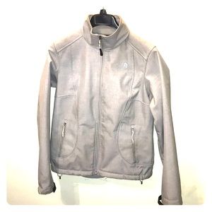 Grey North Face jacket in a size Medium